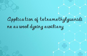 application of tetramethylguanidine as wool dyeing auxiliary